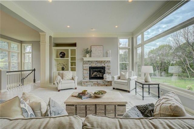 278 Saint Annes Pkwy, Hudson, WI 54016 - living room with a fireplace, ornamental molding, and baseboards
