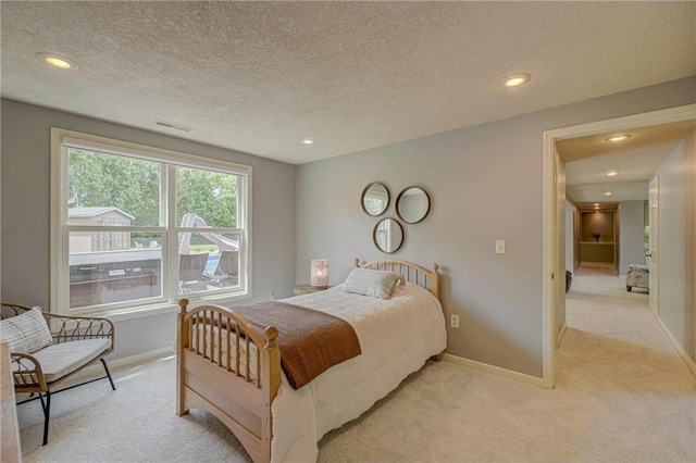278 Saint Annes Pkwy, Hudson, WI 54016 - bedroom with light colored carpet, baseboards, a textured ceiling, and recessed lighting
