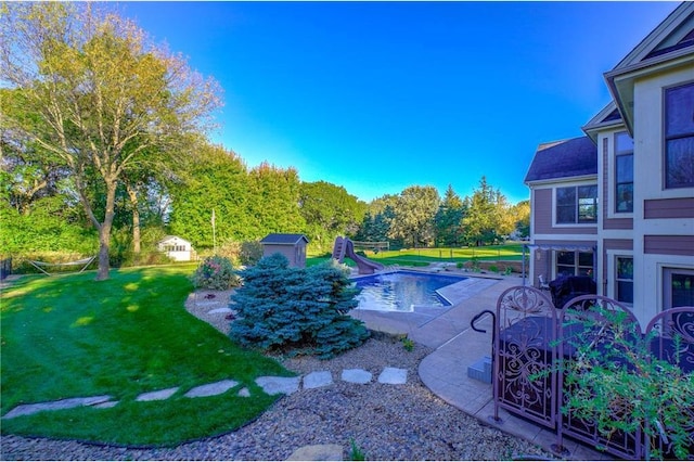 278 Saint Annes Pkwy, Hudson, WI 54016 - swimming pool with a water slide, a lawn, and a patio