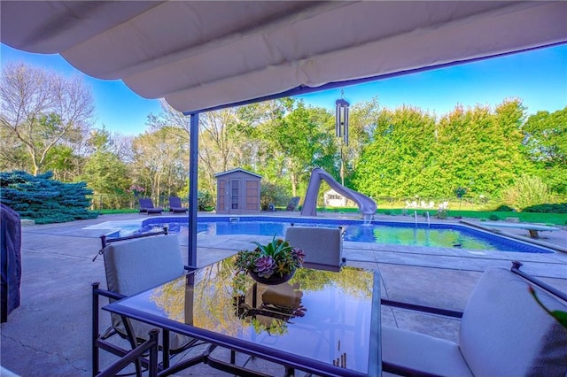 278 Saint Annes Pkwy, Hudson, WI 54016 - view of patio / terrace featuring outdoor dining area, an outdoor pool, and view of scattered trees