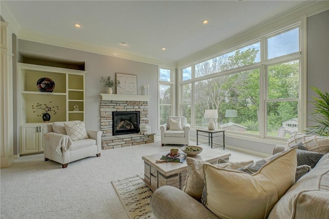 278 Saint Annes Pkwy, Hudson, WI 54016 - living room with light colored carpet, crown molding, plenty of natural light, a glass covered fireplace, and recessed lighting