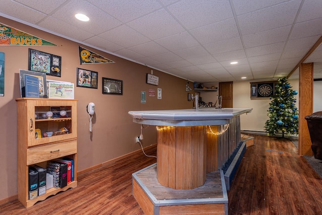 315 N 7th St, Colby, WI 54421 - indoor bar with dark wood finished floors, baseboards, recessed lighting, and a drop ceiling