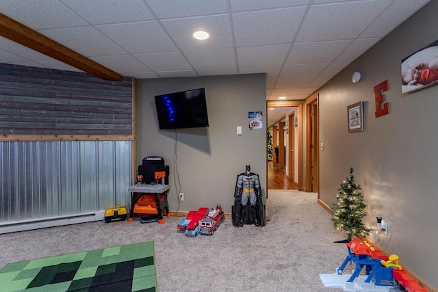 315 N 7th St, Colby, WI 54421 - game room with carpet floors, baseboard heating, baseboards, recessed lighting, and a paneled ceiling