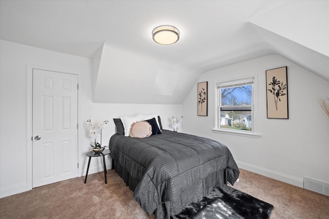 4193 N 19th Pl, Milwaukee, WI 53209 - carpeted bedroom featuring vaulted ceiling and baseboards