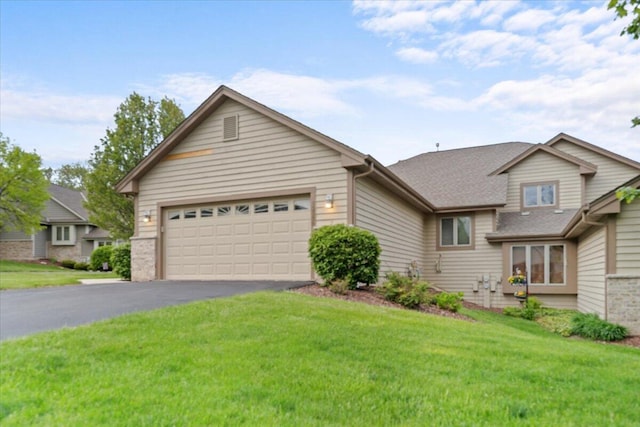 12356 W Waterford Ave, Greenfield, WI 53228 - view of front of property featuring driveway, a garage, a front yard, and roof with shingles