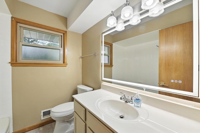 4349 N 80th St, Milwaukee, WI 53222 - bathroom featuring toilet, vanity, tile patterned flooring, and baseboards