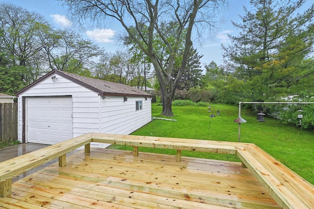 4349 N 80th St, Milwaukee, WI 53222 - wooden deck featuring a garage, an outdoor structure, and a lawn