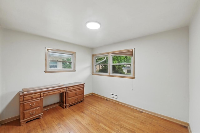 4349 N 80th St, Milwaukee, WI 53222 - unfurnished office featuring light wood-style flooring and baseboards