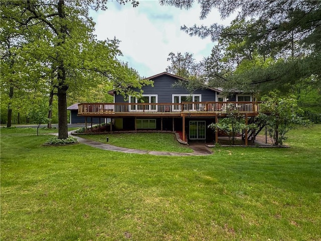 8054 223rd St, Cadott, WI 54727 - back of property with a wooden deck and a yard