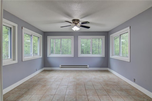 8054 223rd St, Cadott, WI 54727 - unfurnished sunroom with baseboard heating and plenty of natural light