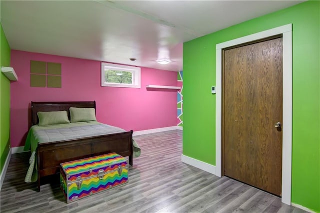 8054 223rd St, Cadott, WI 54727 - bedroom featuring wood finished floors and baseboards