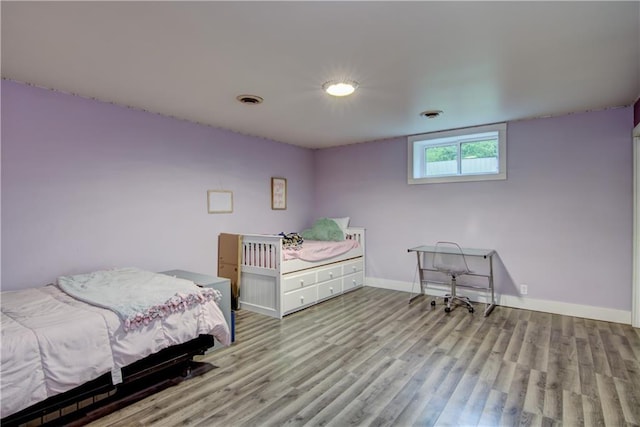 8054 223rd St, Cadott, WI 54727 - bedroom with wood finished floors and baseboards