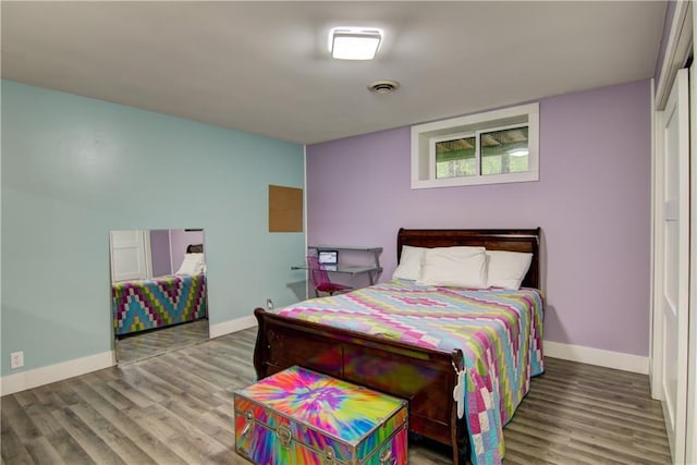 8054 223rd St, Cadott, WI 54727 - bedroom with wood finished floors and baseboards