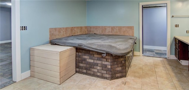 8054 223rd St, Cadott, WI 54727 - bathroom featuring vanity, tile patterned flooring, and baseboards