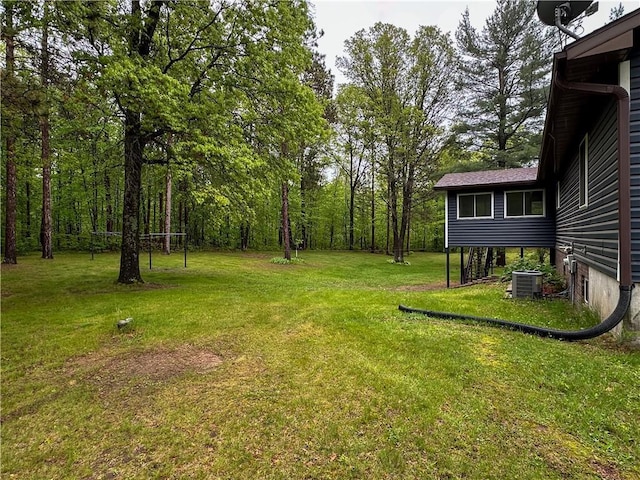 8054 223rd St, Cadott, WI 54727 - view of grassy yard with central AC unit