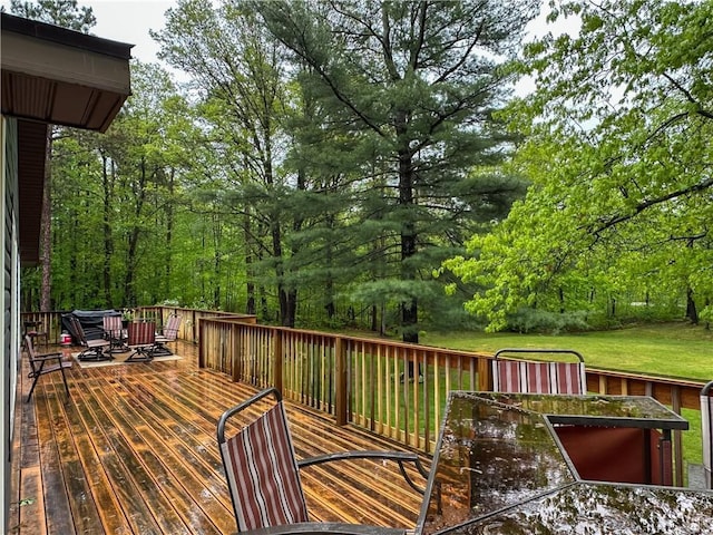 8054 223rd St, Cadott, WI 54727 - wooden terrace featuring outdoor dining area and a lawn