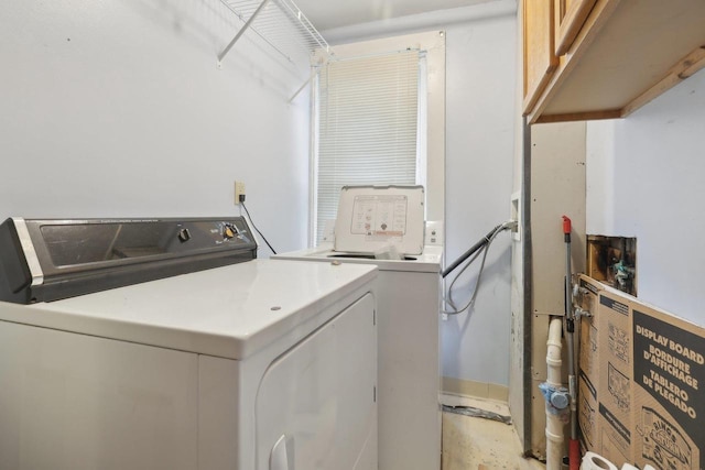 146 S Washington St, Waterloo, WI 53594 - laundry area featuring cabinet space and washing machine and dryer