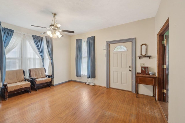 146 S Washington St, Waterloo, WI 53594 - entrance foyer featuring light wood-style flooring and a ceiling fan