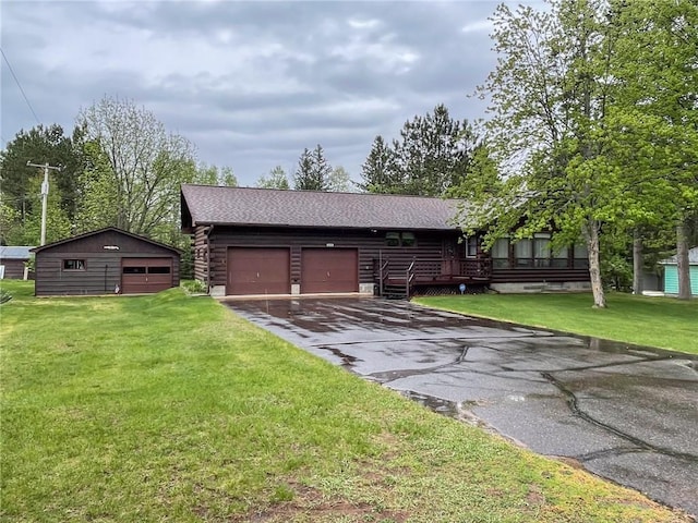 10790 Beal Ave, Hayward, WI 54843 - garage featuring driveway