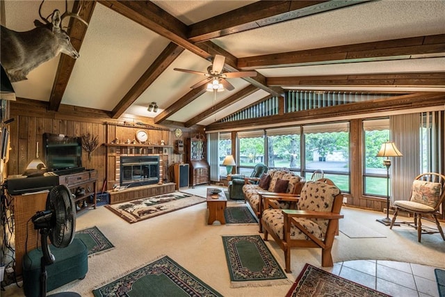 10790 Beal Ave, Hayward, WI 54843 - carpeted living room with ceiling fan, wood walls, and a brick fireplace