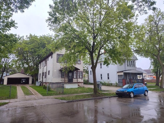 1832 S 18th St Unit 1834, Milwaukee, WI 53204 - view of front of home featuring a garage and an outbuilding