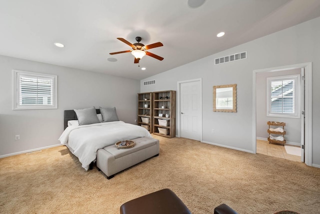 485 Mill St, Fontana, WI 53125 - bedroom with carpet floors, multiple windows, vaulted ceiling, baseboards, and a ceiling fan