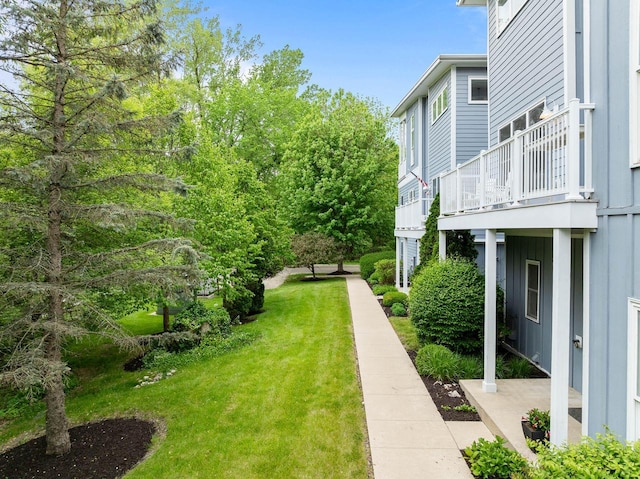 485 Mill St, Fontana, WI 53125 - view of grassy yard with a balcony