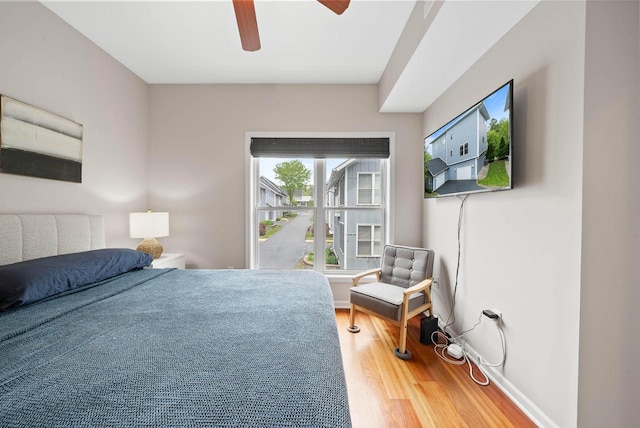 485 Mill St, Fontana, WI 53125 - bedroom with wood finished floors and a ceiling fan