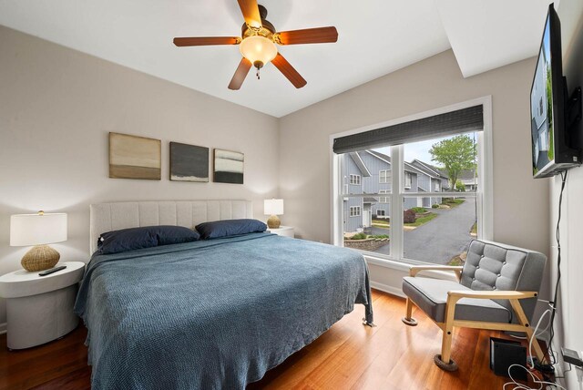 485 Mill St, Fontana, WI 53125 - bedroom with wood finished floors, ceiling fan, and baseboards