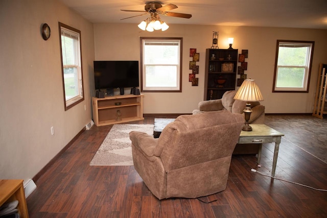 207 S Beach St, Plainfield, WI 54966 - living room with ceiling fan, wood finished floors, and baseboards