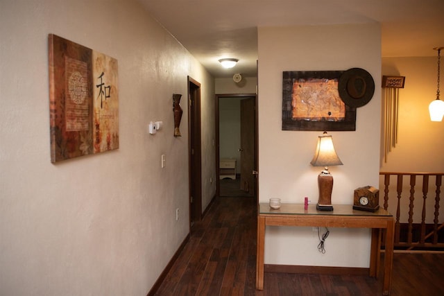 207 S Beach St, Plainfield, WI 54966 - hallway featuring dark wood-style floors and baseboards