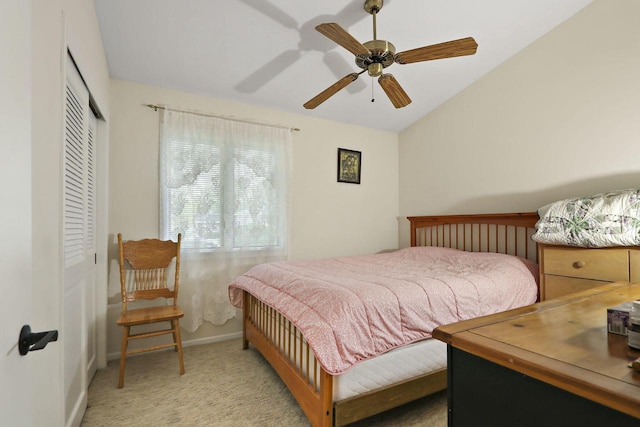 8124 W Imperial Dr, Franklin, WI 53132 - bedroom featuring a closet, light colored carpet, vaulted ceiling, baseboards, and ceiling fan
