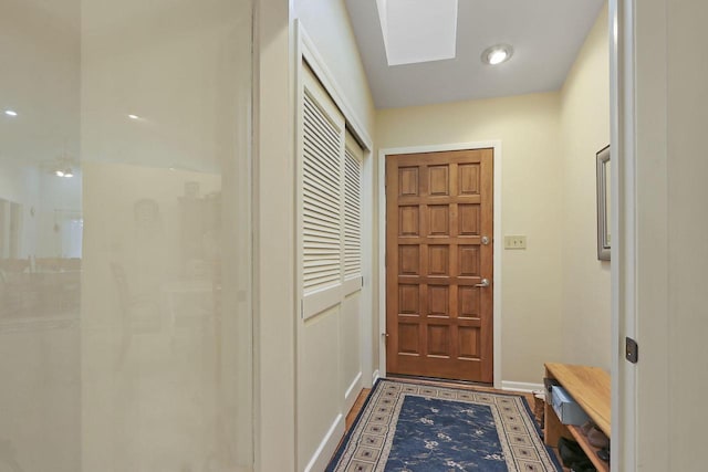 8124 W Imperial Dr, Franklin, WI 53132 - doorway featuring baseboards and a skylight