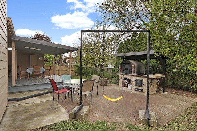8124 W Imperial Dr, Franklin, WI 53132 - view of patio with a wooden deck and outdoor dining area