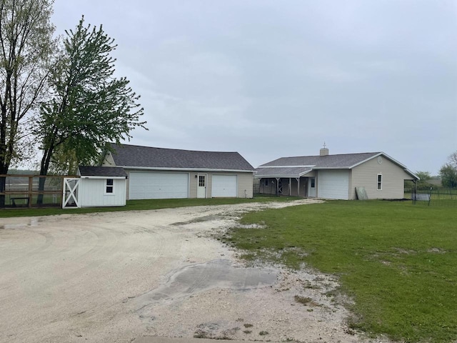 6831 Marken Rd, Valders, WI 54245 - view of front facade featuring an outbuilding and driveway