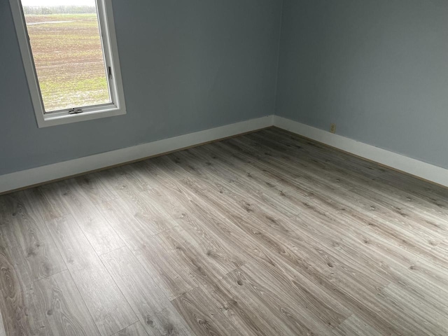 6831 Marken Rd, Valders, WI 54245 - spare room with wood finished floors and baseboards