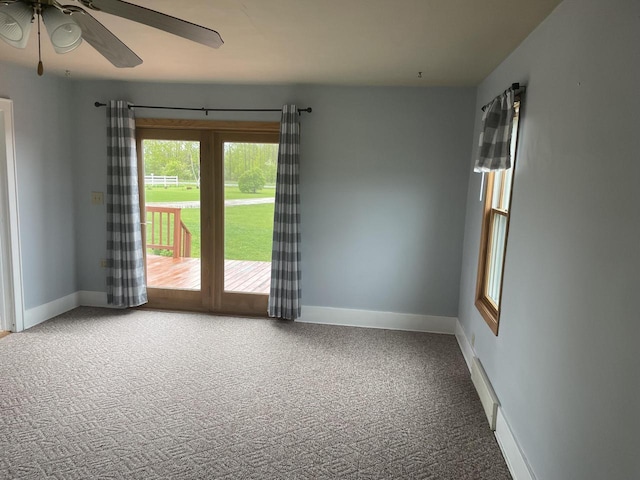 6831 Marken Rd, Valders, WI 54245 - carpeted spare room with baseboards and ceiling fan