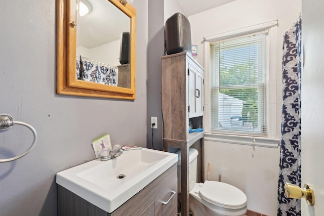 4227 W Concordia Ave, Milwaukee, WI 53216 - bathroom with vanity, toilet, and curtained shower