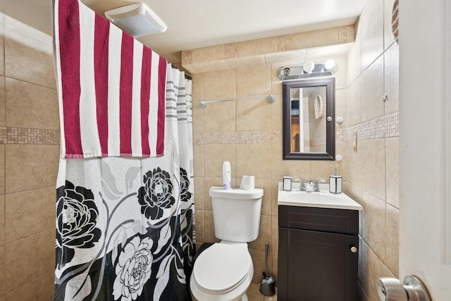 4227 W Concordia Ave, Milwaukee, WI 53216 - full bath featuring tile walls, vanity, toilet, and curtained shower