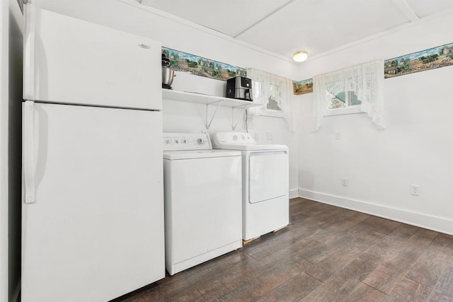 25 E 1st St, Clintonville, WI 54929 - washroom featuring washing machine and dryer, dark wood finished floors, and baseboards