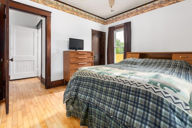 25 E 1st St, Clintonville, WI 54929 - bedroom featuring light wood finished floors, baseboards, and a ceiling fan