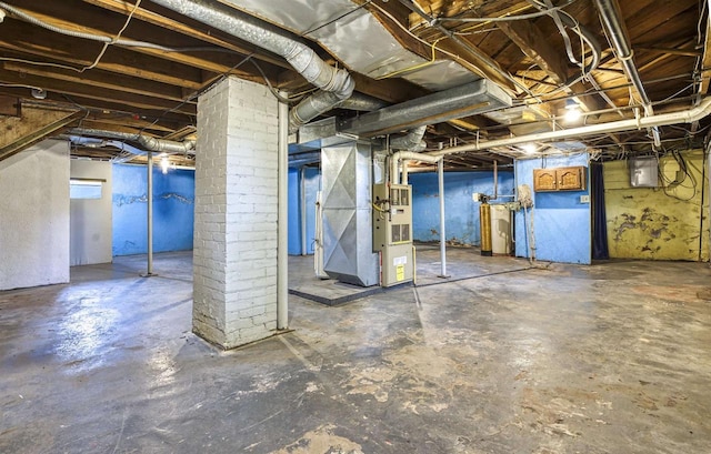 25 E 1st St, Clintonville, WI 54929 - unfinished below grade area featuring heating unit and electric panel