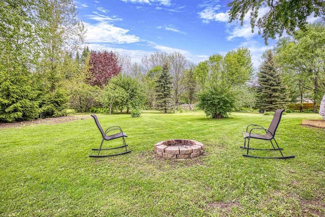 25 E 1st St, Clintonville, WI 54929 - view of grassy yard with an outdoor fire pit