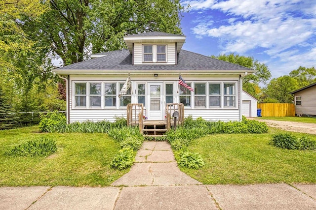 25 E 1st St, Clintonville, WI 54929 - view of front of property with a shingled roof and driveway