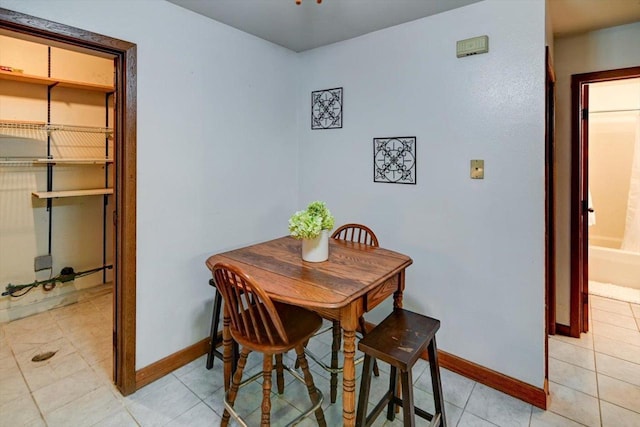 887 Kottke Dr Unit 887, Madison, WI 53719 - dining space featuring baseboards and light tile patterned floors