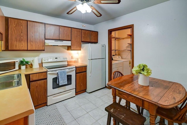 887 Kottke Dr Unit 887, Madison, WI 53719 - kitchen featuring white appliances, washing machine and clothes dryer, under cabinet range hood, a sink, and ceiling fan