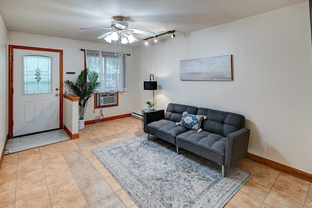 887 Kottke Dr Unit 887, Madison, WI 53719 - living area featuring a ceiling fan, a baseboard radiator, baseboards, rail lighting, and light tile patterned floors