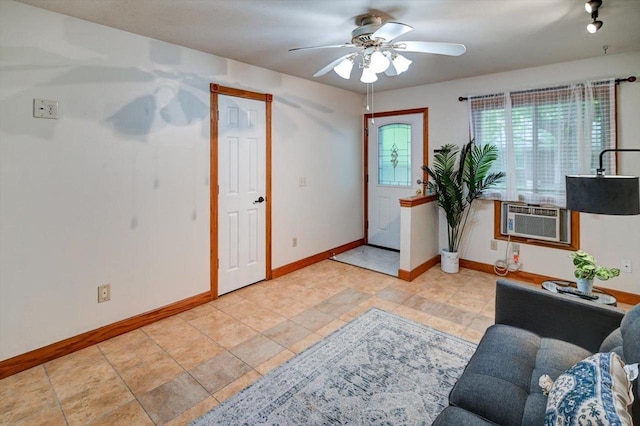 887 Kottke Dr Unit 887, Madison, WI 53719 - living area featuring a ceiling fan and baseboards