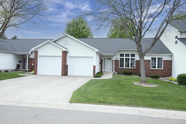 3205 N Mistwood Ln, Appleton, WI 54914 - ranch-style home with brick siding, a garage, a front yard, and driveway