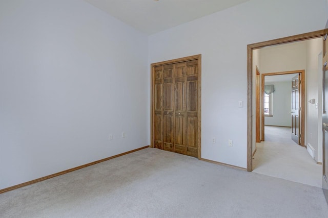 3205 N Mistwood Ln, Appleton, WI 54914 - unfurnished bedroom featuring carpet floors, a closet, and baseboards